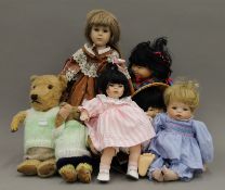 A quantity of dolls and teddy bears. The largest 45 cm high.