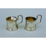 A pair of Russian silver tankards. 9 cm high. 270 grammes.