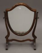 An early 20th century mahogany toilet mirror. 30 cm wide.