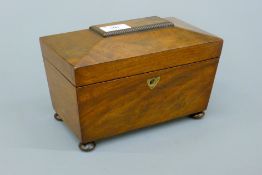 A 19th century mahogany tea caddy. 22.5 cm wide.