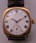 A 9 ct gold cased Zenith gentleman's wristwatch. 3.5 cm wide.