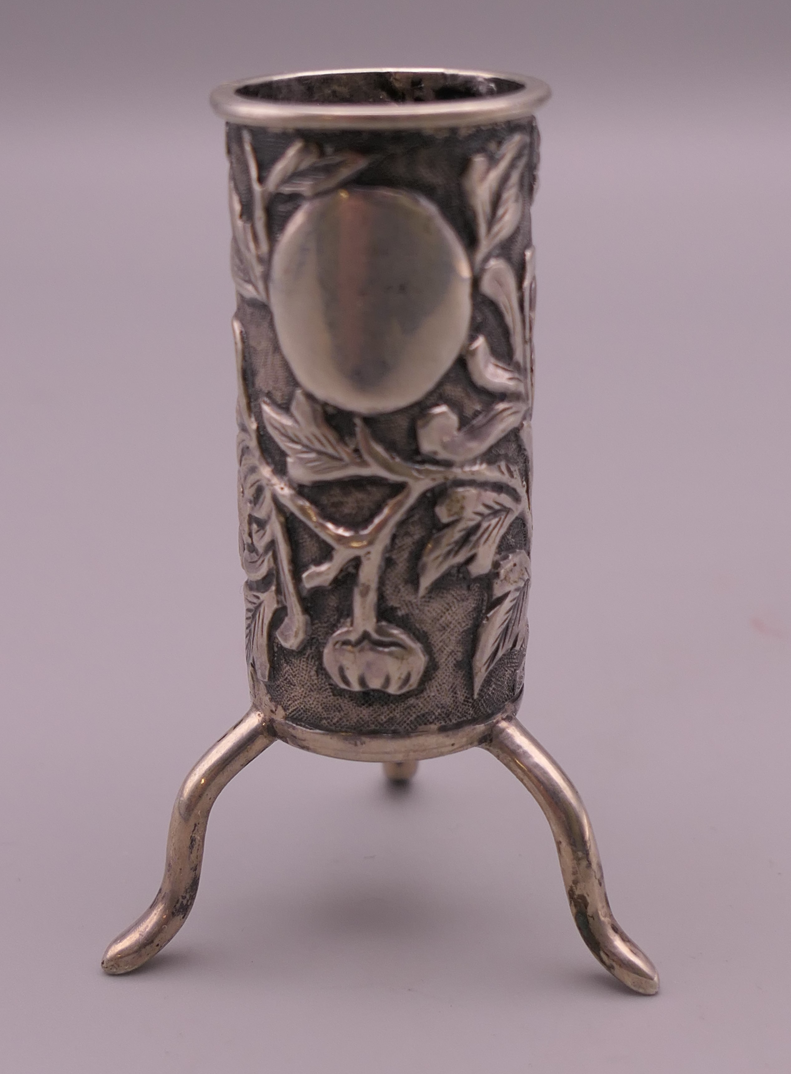 A small Chinese silver bud vase. 6 cm high.