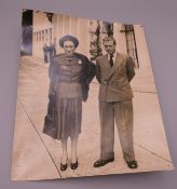A photograph of The Duke and Duchess of Windsor, the reverse with label dated 16.5.47. 20 x 25 cm.