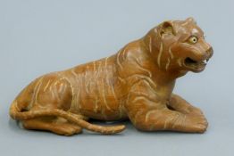 A model of a tiger. 13.5 cm long.