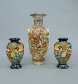 Three late 19th/early 20th century Japanese vases. The largest 45.5 cm high.