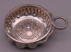 A Confrerie des Chevaliers du Tastevin silver plated wine tasting cup. 10.