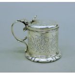 A Victorian silver mustard pot. 7 cm high. 147.4 grammes.