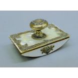 A Victorian unmarked silver mounted mother-of pearl blotter. 9.5 cm long.