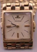 A 9 ct gold Jaeger LeCoultre ladies wristwatch. 1.75 cm wide. 29.4 grammes total weight.