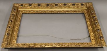 A large gilt picture frame. Overall size 98 x 71.5 cm, internal size 76 x 50.5 cm.