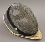 A Leon Paul fencing mask.