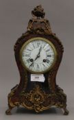 A 19th century Boulle mantle clock. 34.5 cm high.