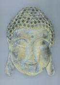 A large Buddha mask wall plaque. 56 cm high.