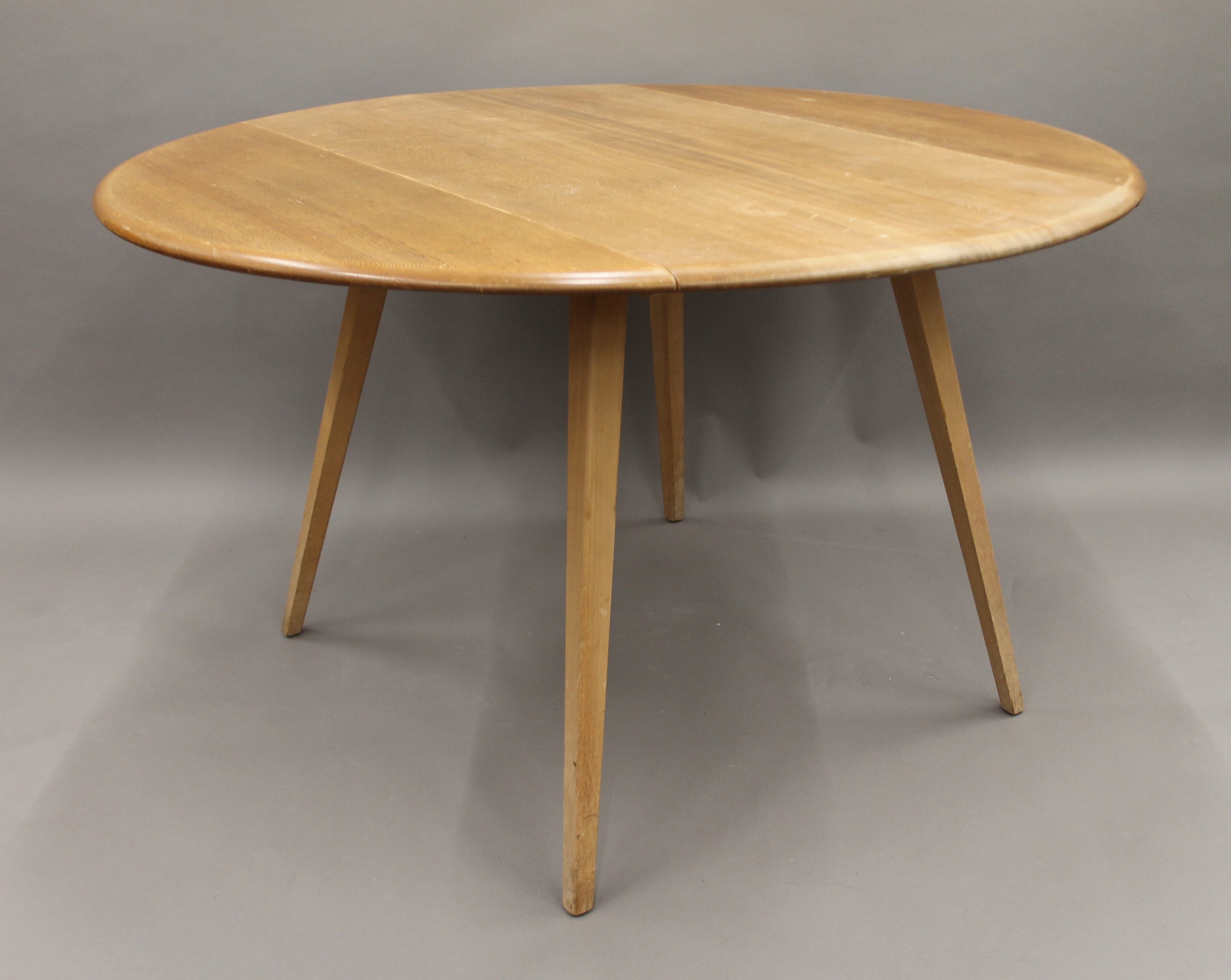 A blonde Ercol drop leaf table and two chairs. The table 112 cm long. - Image 4 of 8