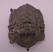 An early Tibetan bronze Tabij. 9 cm wide.