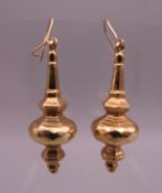 A pair of 9 ct gold pendant earrings. 4.7 cm high. 2.7 grammes.