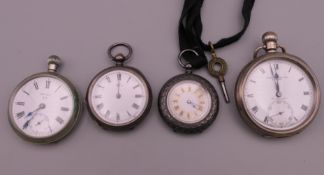 Three silver pocket watches and a plated pocket watch. The largest 5 cm diameter.