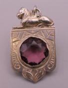 A Victorian silver and amethyst pendant. 3.5 cm high.