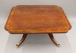 A large modern coffee table. 120 cm wide x 106.5 cm deep x 49.5 cm high.