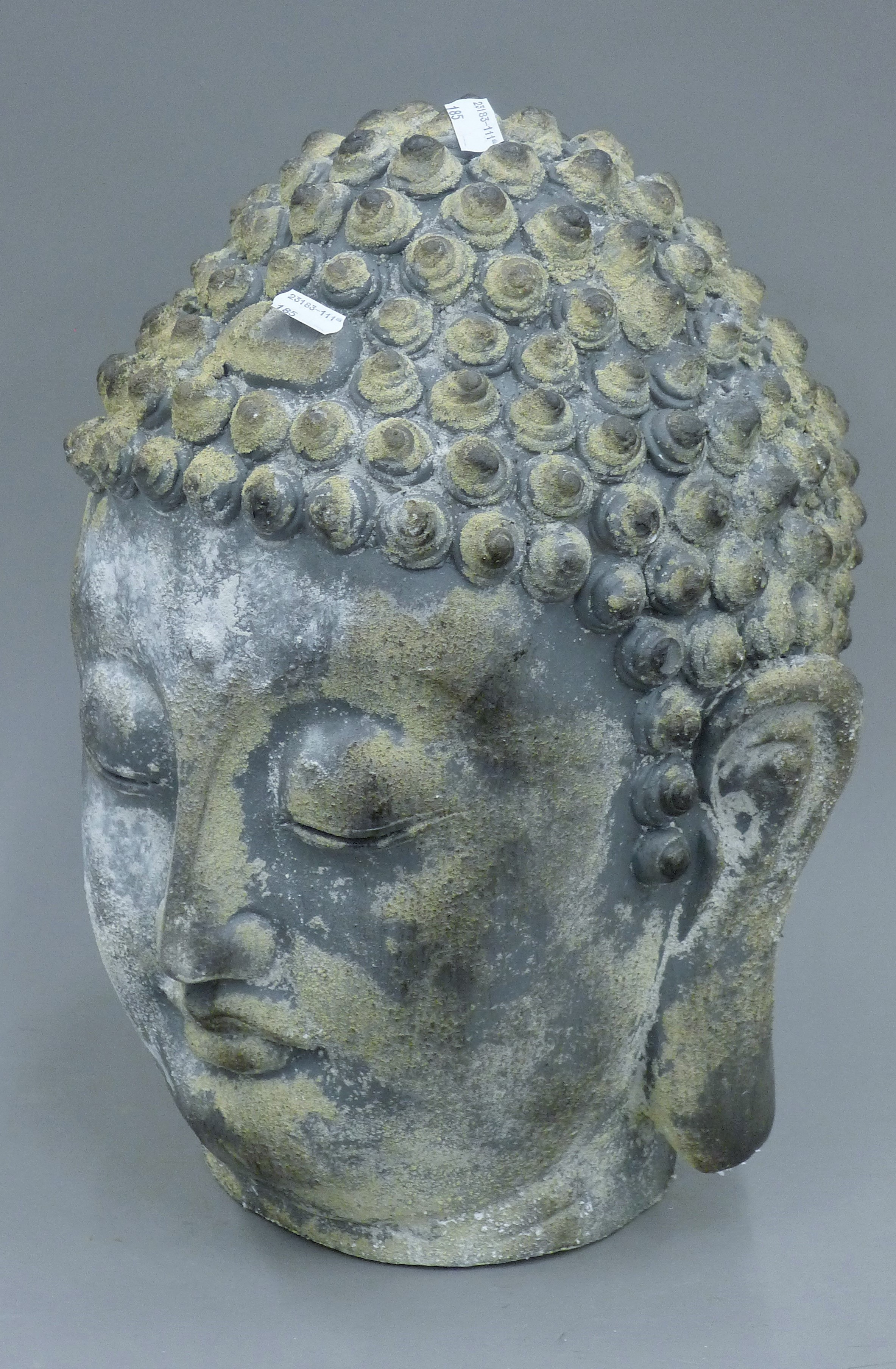 A large Buddha head. 41 cm high. - Image 2 of 4