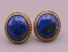 A pair of late 20th century 9 ct gold lapis lazuli earrings,