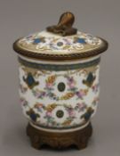 A bronze mounted Sevres porcelain pot and cover. 13 cm high.
