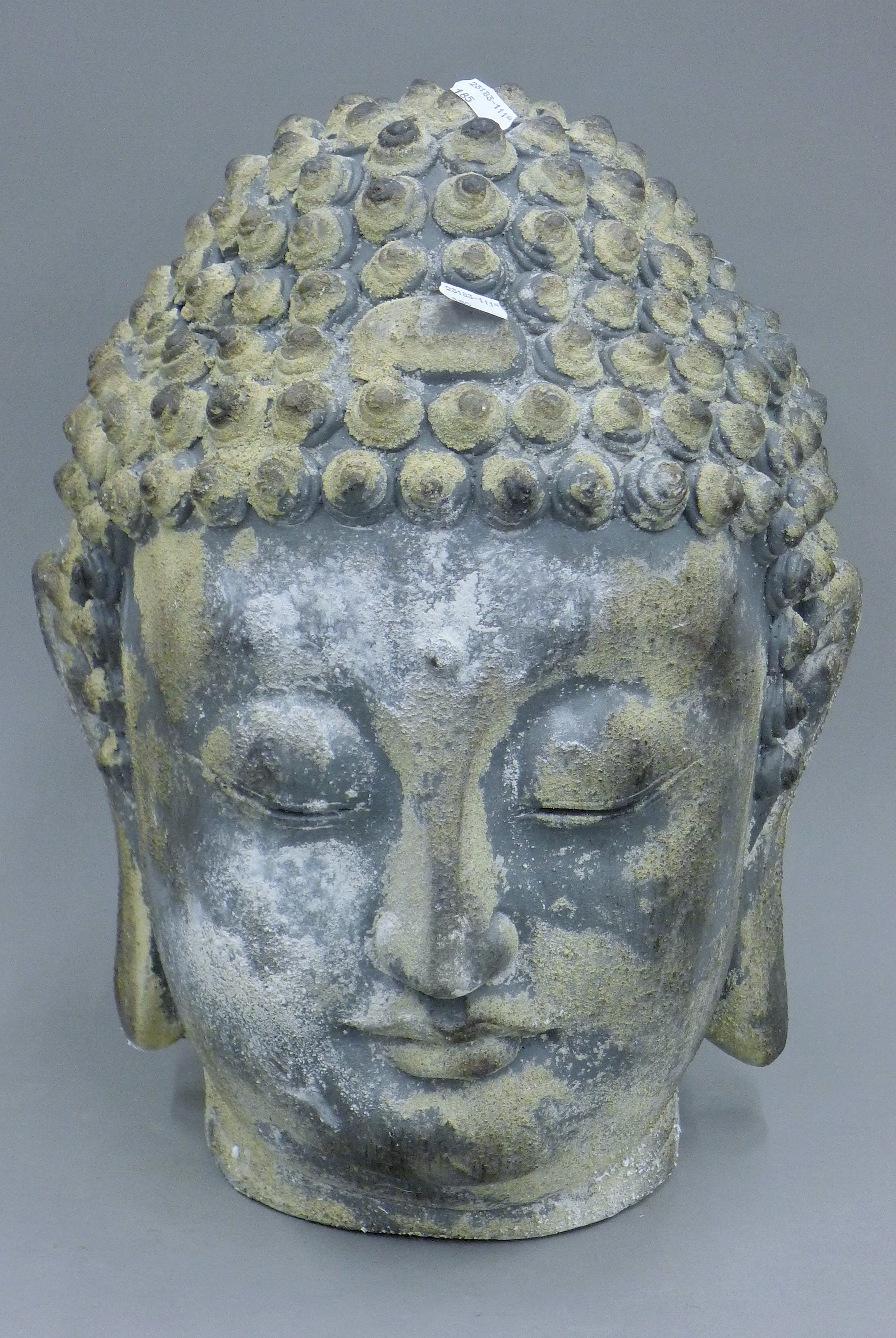 A large Buddha head. 41 cm high.