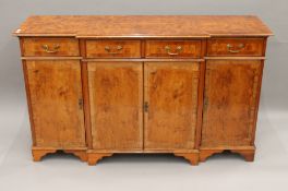 A modern yew wood sideboard and a wi-fi unit. The former 152 cm wide.