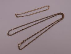 A 9 ct gold bracelet and a gold plated watch chain. The former 18 cm long and 1.9 grammes.