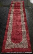 A Kirman runner. 460 x 110 cm.