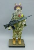 A taxidermy specimen of a Red fox Vulpes vulpes dressed as a soldier in the Parachute Regiment.