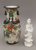 A Chinese vase and a blanc de chine model of Guanyin. The former 35 cm high.