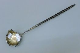 A Georgian baleen handled silver toddy ladle. 39.5 cm long.