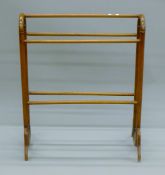 A Victorian mahogany towel rail. 71 cm wide.