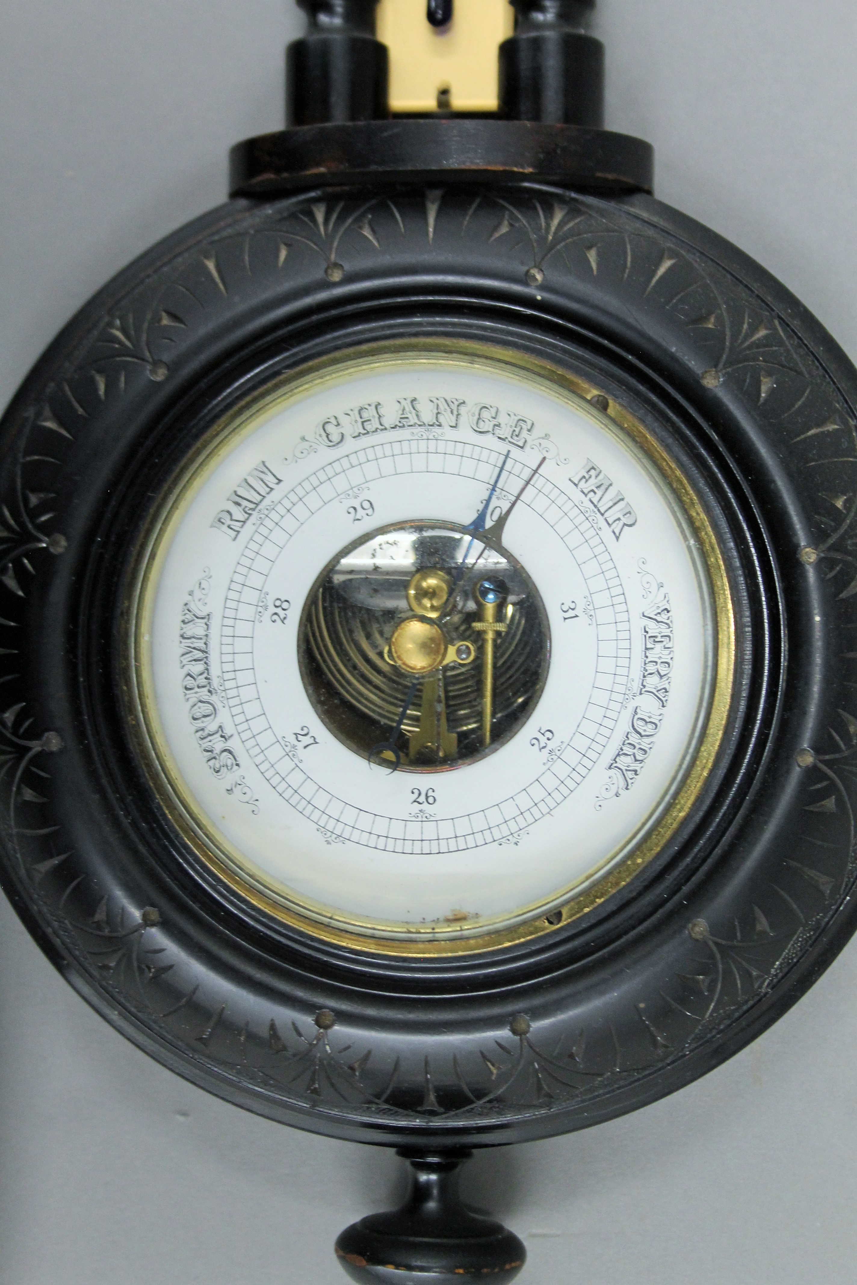 A Victorian ebonised aneroid barometer. 45 cm high. - Image 4 of 4