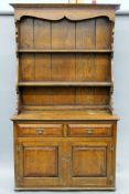 A cross banded oak dresser. 116 cm wide.