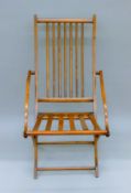 A 19th century folding chair. 53 cm wide.