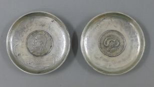 Two Chinese coin dishes. 9 cm diameter.