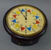 A fusee wall clock. 38 cm diameter.