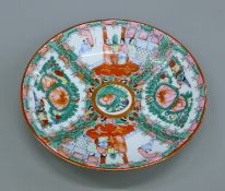 A Chinese porcelain dish. 30 cm diameter.