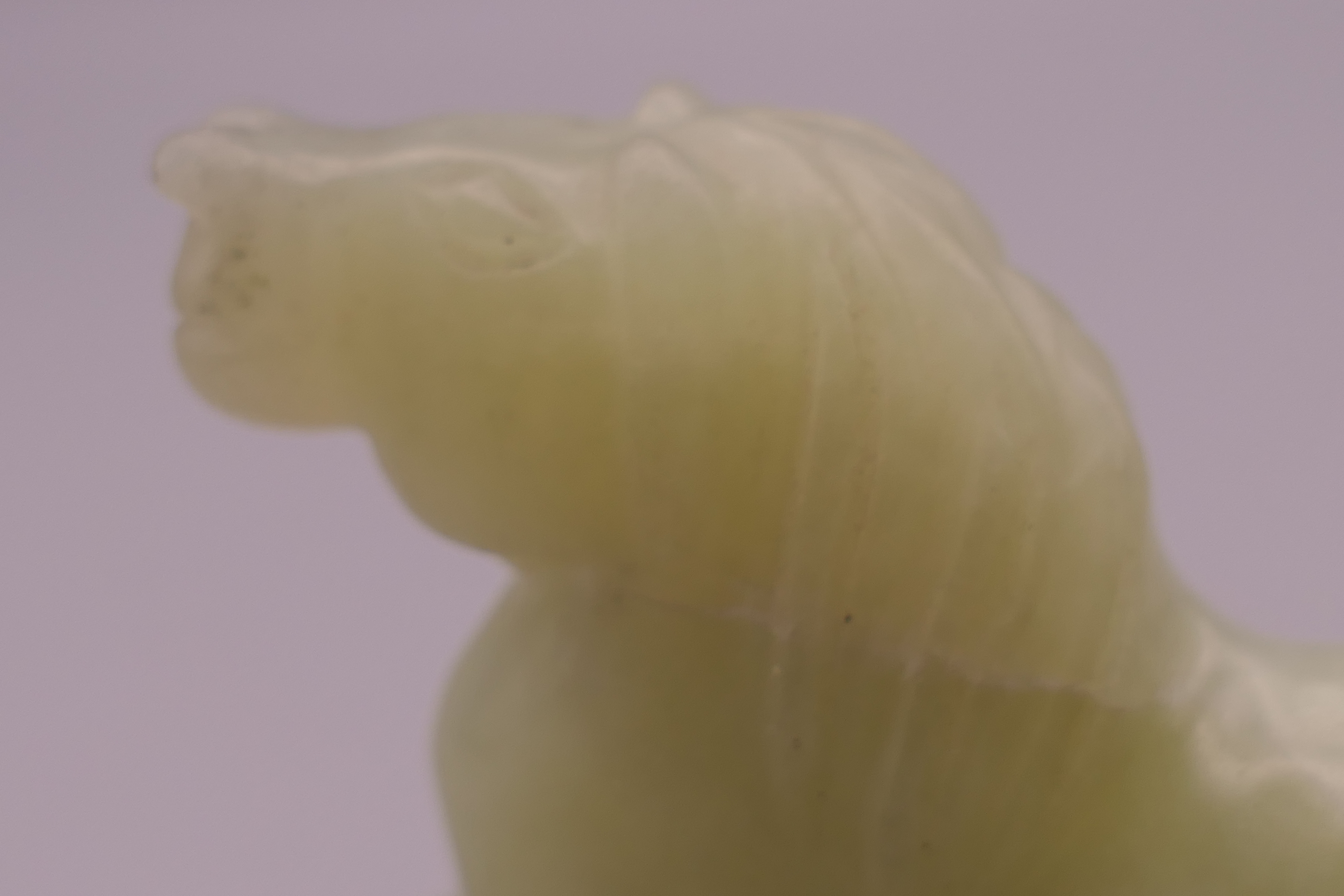 A Chinese pale green jade horse. 7.5 cm long. - Image 4 of 4