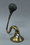 A vintage brass car horn. 39.5 cm long.