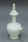 A Song Dynasty type white blazed Buddhist Kundika vessel with dragon head spout. 26 cm high.