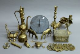 A quantity of brassware and a sundial.