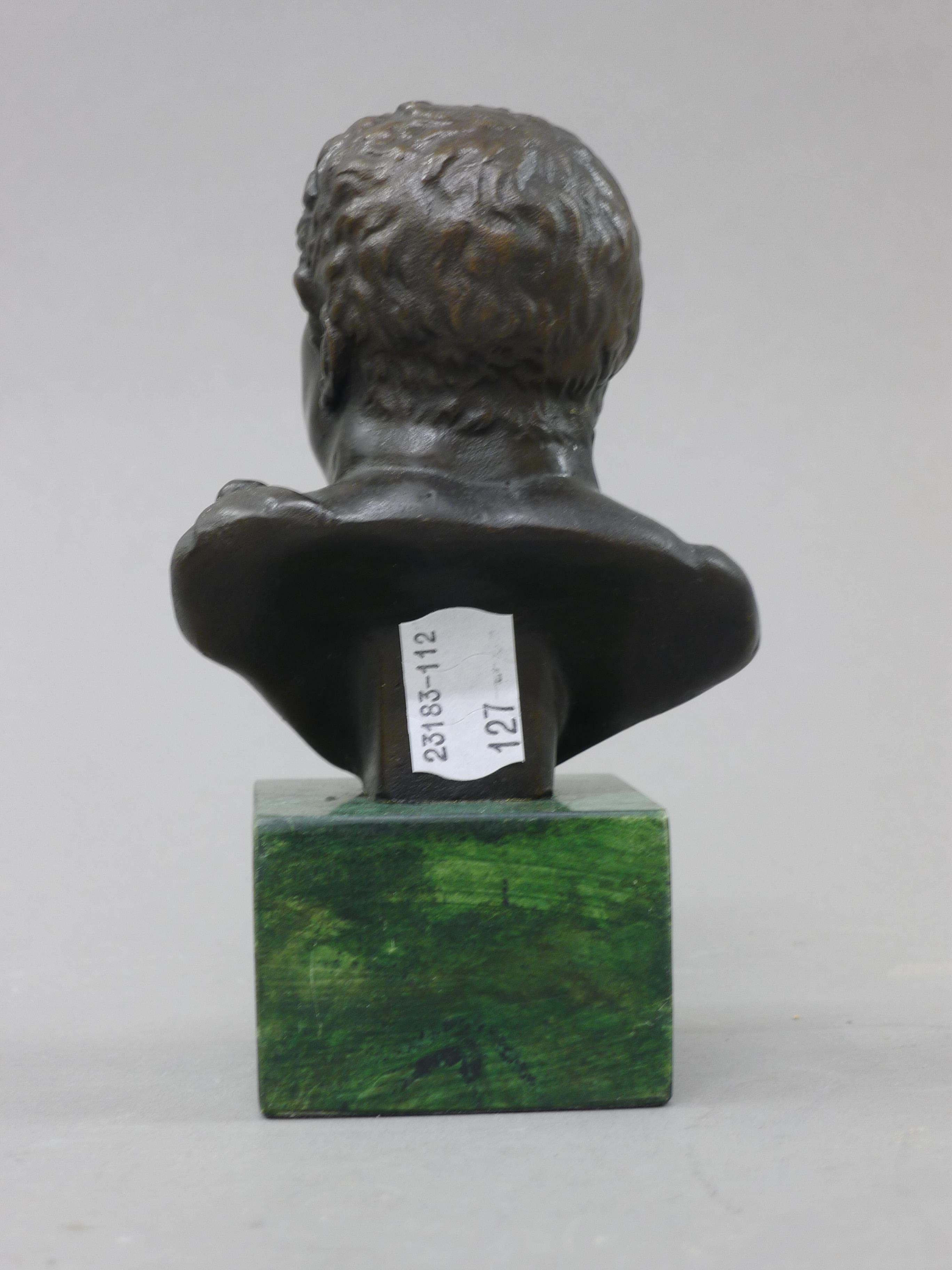 A small bronze bust on a marble plinth. 14 cm high. - Image 3 of 3