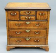 An 18th century and later walnut chest of drawers. 81 cm wide.