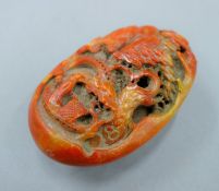 A model of a Chinese pebble carving. 8 cm high.