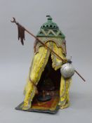 A cold painted bronze model of an Arab tent. 33 cm high.