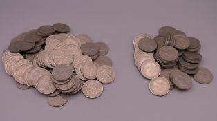 A quantity of Florins (two shilling coins) (2 bags) (142 total), 1956 (x50) and 1957 (x92).