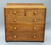 An early 20th century oak chest of drawers. 104.5 cm wide, 99 cm high, 51 cm deep.